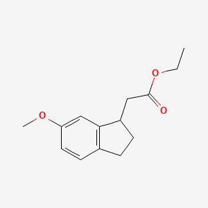 molecular formula C14H18O3 B8616820 Ethyl (6-methoxyindan-1-yl)acetate 