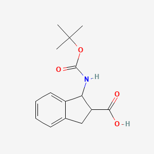 molecular formula C15H19NO4 B8625825 1-[(tert-Butoxycarbonyl)amino]-2,3-dihydro-1H-indene-2-carboxylic acid 