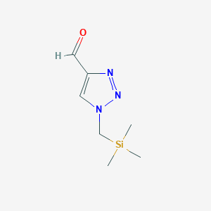 molecular formula C7H13N3OSi B8627031 1-[(Trimethylsilyl)methyl]-1H-1,2,3-triazole-4-carbaldehyde 