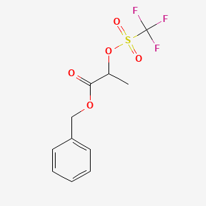 molecular formula C11H11F3O5S B8637672 Benzyl 2-trifluoromethanesulfonyloxypropionate 