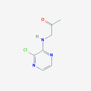 molecular formula C7H8ClN3O B8654748 3-Chloro-2-(2-oxo-1-propanamino)pyrazine 