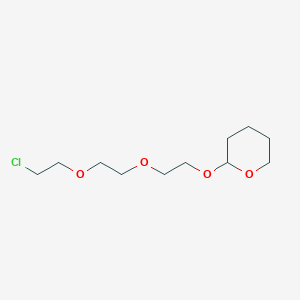2-{2-[2-(2-Chloroethoxy)ethoxy]ethoxy}oxane