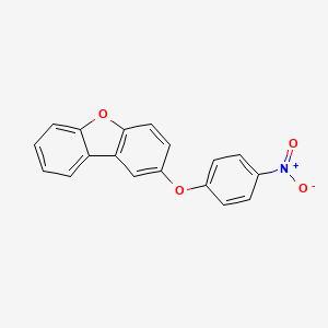 molecular formula C18H11NO4 B8659592 4-(Dibenzofuran-2-yloxy)-1-nitrobenzene 
