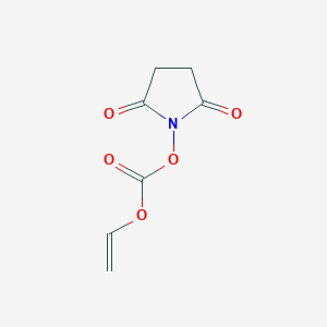 molecular formula C7H7NO5 B8663408 1-{[(Ethenyloxy)carbonyl]oxy}pyrrolidine-2,5-dione CAS No. 134072-86-9