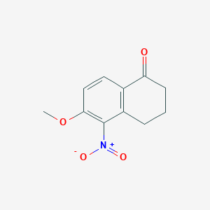 molecular formula C11H11NO4 B8664557 6-Methoxy-5-nitro-1-tetralone 