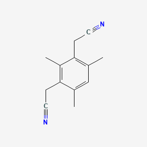 molecular formula C13H14N2 B8681320 1,3-Bis(cyanomethyl)-2,4,6-trimethylbenzene 