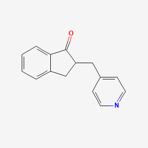 molecular formula C15H13NO B8688937 2-Pyridin-4-ylmethyl-indan-1-one CAS No. 4803-61-6