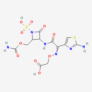 molecular formula C12H14N6O10S2 B8691626 ({[1-(2-Amino-1,3-thiazol-4-yl)-2-({2-[(carbamoyloxy)methyl]-4-oxo-1-sulfoazetidin-3-yl}amino)-2-oxoethylidene]amino}oxy)acetic acid 