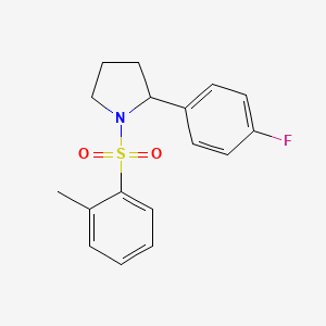 2-(4-Fluorophenyl)-1-[(2-methylphenyl)sulfonyl]pyrrolidine