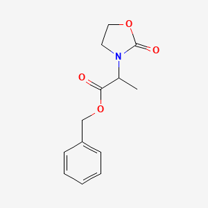 molecular formula C13H15NO4 B8695738 Benzyl 2-(2-oxo-1,3-oxazolidin-3-yl)propanoate 
