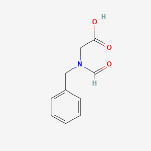 (Benzyl-formylamino)acetic acid