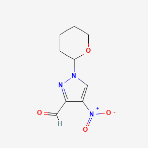 B8696906 4-Nitro-1-(tetrahydro-2H-pyran-2-yl)-1H-pyrazole-3-carbaldehyde CAS No. 518990-08-4