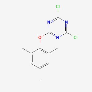 molecular formula C12H11Cl2N3O B8697455 2,4-Dichloro-6-(2,4,6-trimethylphenoxy)-1,3,5-triazine CAS No. 110105-12-9