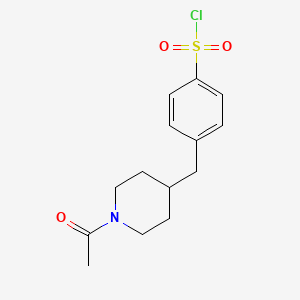 4-[(1-Acetylpiperidin-4-yl)methyl]benzene-1-sulfonyl chloride