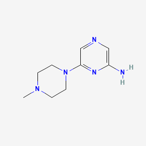molecular formula C9H15N5 B8700358 6-(4-Methylpiperazin-1-yl)pyrazin-2-amine 