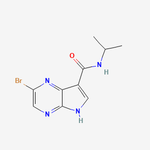 molecular formula C10H11BrN4O B8702775 2-Bromo-N-isopropyl-5H-pyrrolo[2,3-b]pyrazine-7-carboxamide 