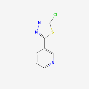 molecular formula C7H4ClN3S B8703579 2-Chloro-5-(3-pyridyl)-[1,3,4]-thiadiazole 