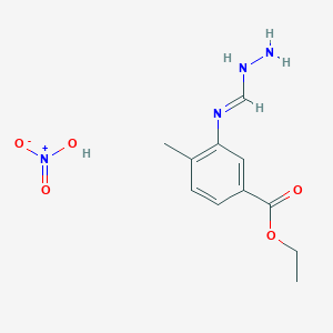 molecular formula C11H16N4O5 B8710831 Ethyl 3-(hydrazinomethyleneamino)-4-methyl-benzoate; nitric acid 