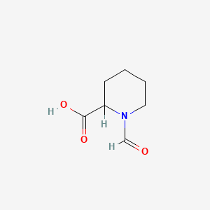 molecular formula C7H11NO3 B8715797 1-Formyl-2-piperidinecarboxylic acid 