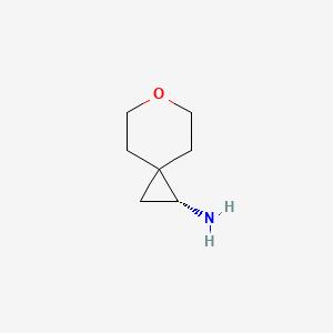 molecular formula C7H13NO B8724317 (1R)-6-Oxaspiro[2.5]octan-1-amine 
