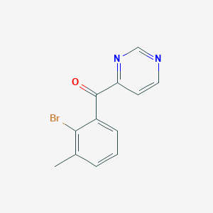molecular formula C12H9BrN2O B8727396 (2-Bromo-3-methylphenyl)(pyrimidin-4-yl)methanone 