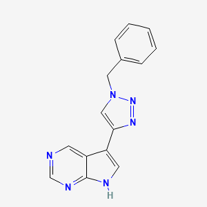 molecular formula C15H12N6 B8735527 5-(1-benzyl-1H-1,2,3-triazol-4-yl)-7H-pyrrolo[2,3-d]pyrimidine 