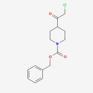 molecular formula C15H18ClNO3 B8737532 1-(Benzyloxycarbonyl)-4-(chloroacetyl)piperidine 