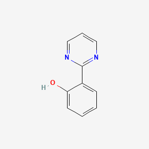 molecular formula C10H8N2O B8744704 Phenol, 2-(2-pyrimidinyl)- CAS No. 64435-20-7