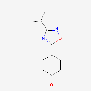 B8750081 4-(3-Isopropyl-1,2,4-oxadiazol-5-YL)cyclohexan-1-one CAS No. 1196486-71-1