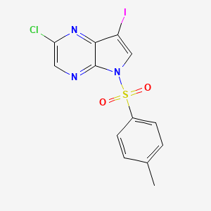 molecular formula C13H9ClIN3O2S B8756130 2-Chloro-7-iodo-5-tosyl-5H-pyrrolo[2,3-b]pyrazine CAS No. 889447-21-6