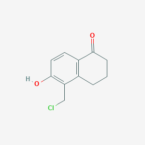 B8756439 5-(chloromethyl)-6-hydroxy-3,4-dihydro-1(2H)-naphthalenone CAS No. 59604-13-6