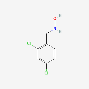 molecular formula C7H7Cl2NO B8768788 N-[(2,4-dichlorophenyl)methyl]hydroxylamine 