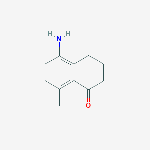 molecular formula C11H13NO B8770845 5-Amino-8-methyl-3,4-dihydronaphthalen-1(2H)-one 