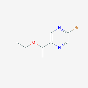 molecular formula C8H9BrN2O B8771771 2-Bromo-5-(1-ethoxyvinyl)pyrazine 