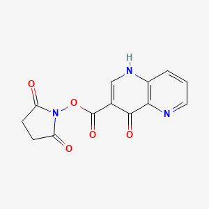 molecular formula C13H9N3O5 B8772223 Succinimido (1,5-naphthyridin-3-yl)formate CAS No. 53512-20-2