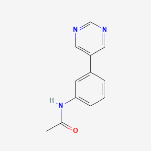 molecular formula C12H11N3O B8776070 N-Acetyl 3-(5-pyrimidyl)aniline 