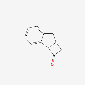 molecular formula C11H10O B8778299 7,7A-dihydro-1H-cyclobuta[a]inden-2(2aH)-one 