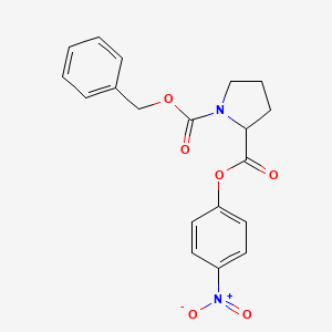 molecular formula C19H18N2O6 B8782942 Carbobenzyloxy-L-proline p-nitrophenyl ester 