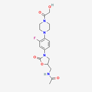 molecular formula C18H23FN4O5 B8794828 N-[[(5S)-3-[3-fluoro-4-[4-(2-hydroxyacetyl)piperazin-1-yl]phenyl]-2-oxo-1,3-oxazolidin-5-yl]methyl]acetamide 