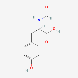 molecular formula C10H11NO4 B8797467 2-Formamido-3-(4-hydroxyphenyl)propanoic acid 