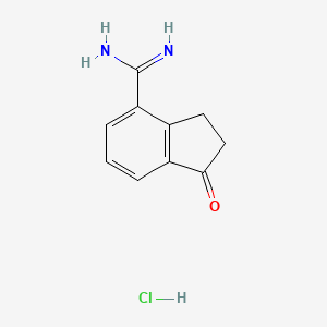 molecular formula C10H11ClN2O B8806610 1-Oxo-2,3-dihydro-1H-indene-4-carboximidamide hydrochloride CAS No. 138764-19-9